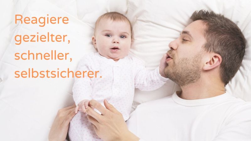 Vater und Baby auf Bett - reagiere gezielter, schneller, selbstsicherer